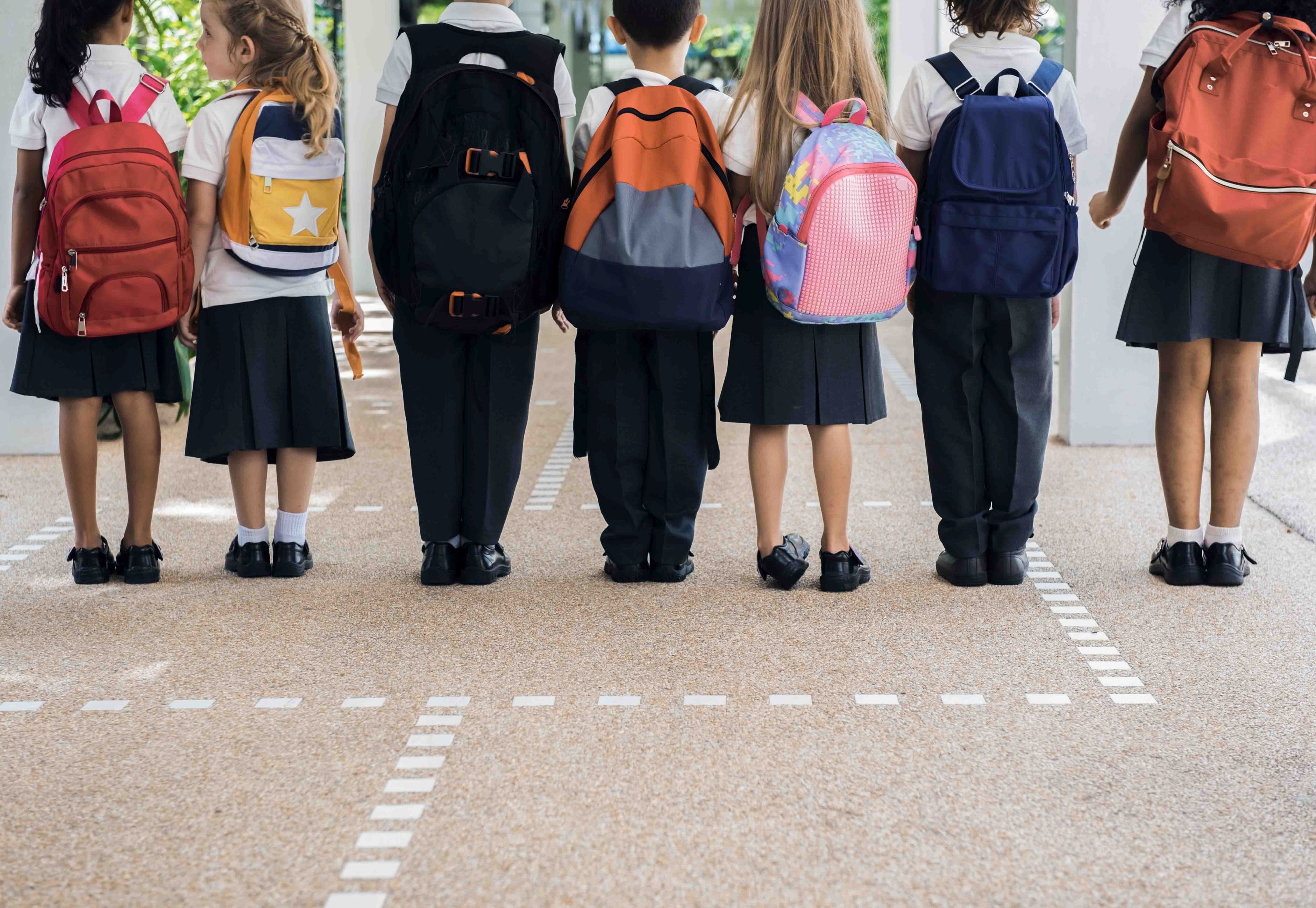 Children with backpacks